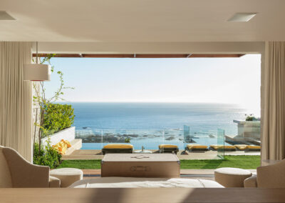 home retreat by the ocean side and sun in the background