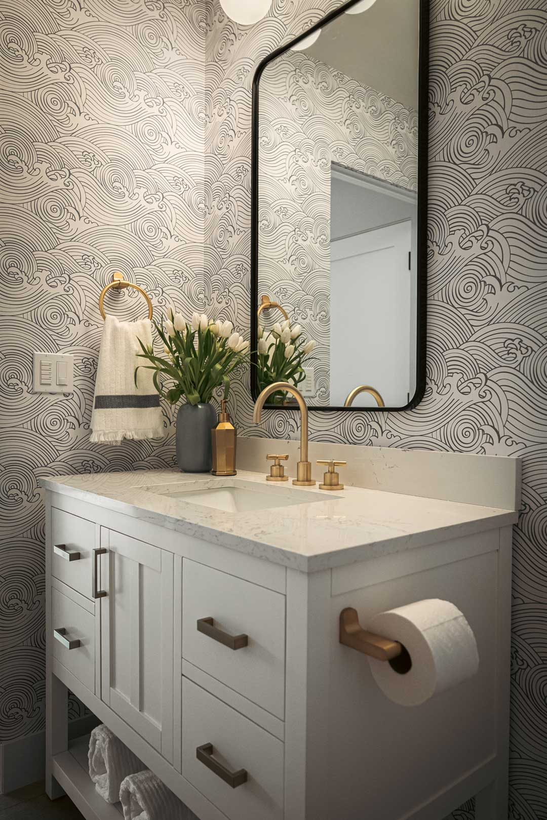 vintage pattern drenching on wall with lamp on cabinet