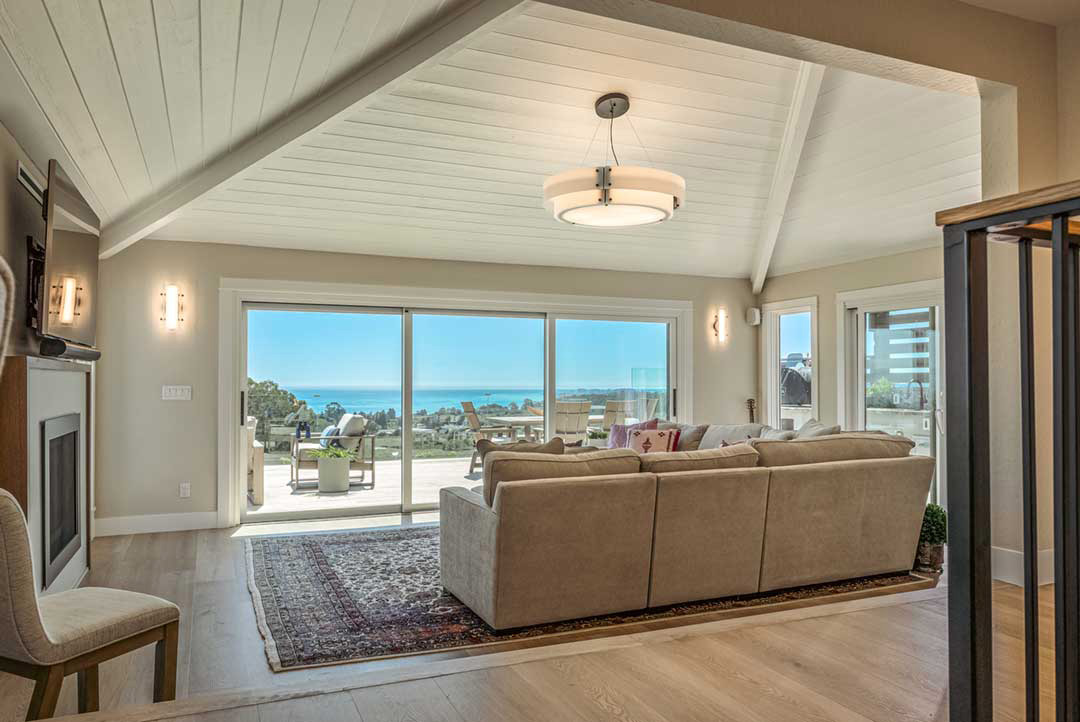 living room with glass door leading to patio